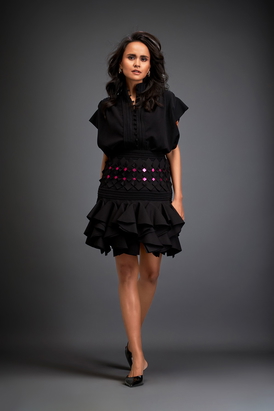 Elegant Ruffled Skirt Paired With A Structured Blouse