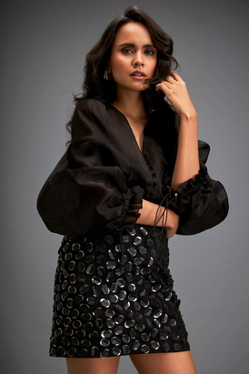 Blouse With Voluminous Sleeves Paired With Mini Skirt